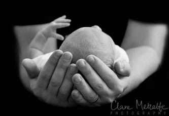 Newborn baby in Daddy's hands