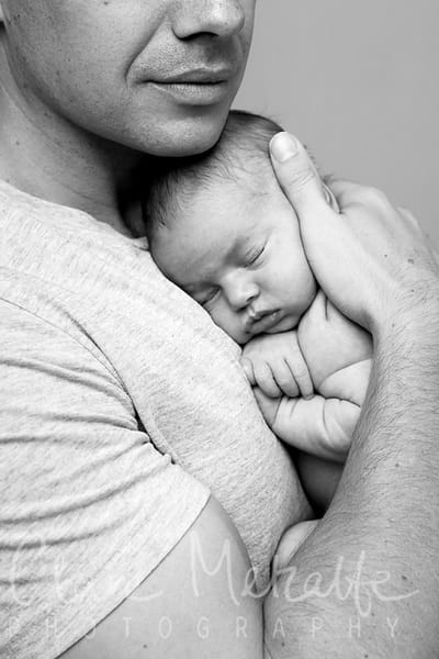 Newborn baby in Daddy's arms