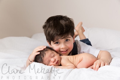 Newborn baby with big brother