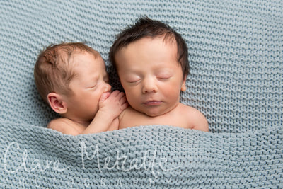 Newborn baby twins whispering
